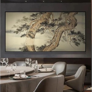 May include: A large framed painting of a stylized tree with a detailed trunk and branches, set against a muted background. The painting hangs above a dining table set with glasses, plates, and chairs.