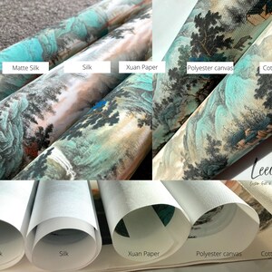 May include: Close-up of five rolled canvas prints with different textures. The prints feature a traditional Chinese landscape painting with mountains, trees, and water. The textures are labeled "Matte Silk", "Silk", "Xuan Paper", "Polyester canvas", and "Cotton Canvas".