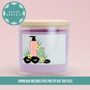 May include: A purple candle jar with a white label featuring a spa-themed design. The design includes a pink bottle with a pump, a green tube, a pair of black eye masks, and a green leaf with a white flower. The label also includes the word "Spa".