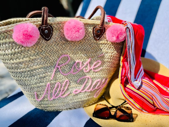 Straw beach tote with pom poms sale