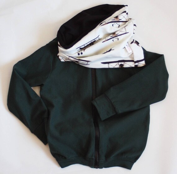 green zip up jumper