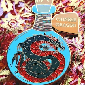 Bottled beasts enamel pin