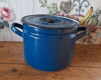 A vibrant blue vintage enamel stock pot/pan