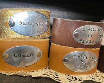 Personalized leather cuffs . Your words . Repurposed, genuine leather . Hand stamped .