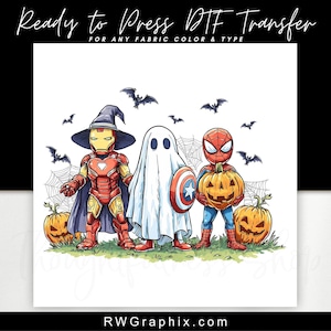 May include: A DTF transfer design featuring Iron Man in a witch hat, a ghost with Captain America's shield, and Spider-Man holding a jack-o'-lantern. Bats and spiderwebs surround the characters, with two pumpkins on the ground. The text reads "Ready to Press DTF Transfer".
