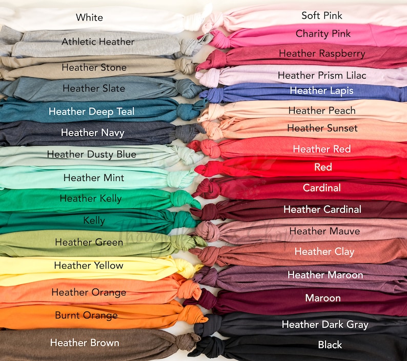May include: A collection of fabric swatches in various colors and shades, including white, black, red, blue, green, yellow, orange, and brown. The swatches are arranged in two columns, with the names of each color printed below the swatch.