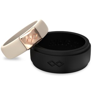 May include: Two silicone rings, one black and one beige, with a rose gold accent on the beige ring. Both rings have a diamond logo on them. The black ring has the word "RingFit" embossed on the inside.