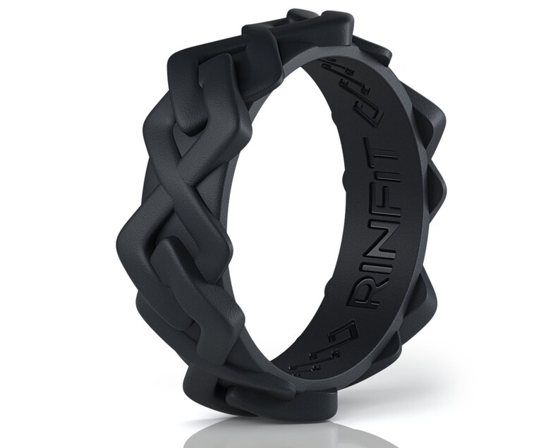 May include: Black silicone ring with a braided design and the word "RINFIT" embossed on the side.
