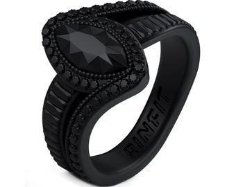 May include: Black silicone ring with a large black gemstone and a smaller black gemstone on the side. The ring is engraved with the word "RINFIT".