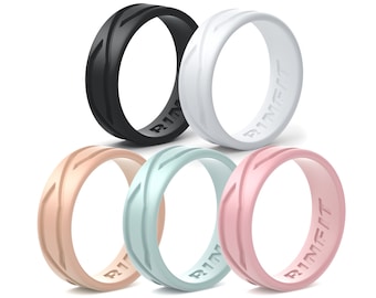 May include: Five silicone rings in different colors: black, white, light pink, light blue, and beige. Each ring has a textured design and the word "RingFit" embossed on the inside.