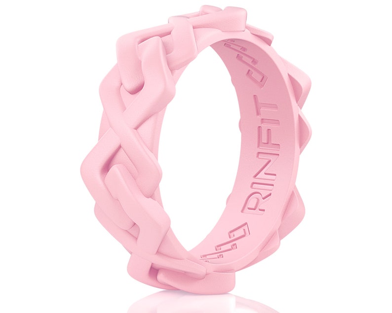 May include: A pink silicone ring with a braided design and the word "RINFIT" embossed on the side.