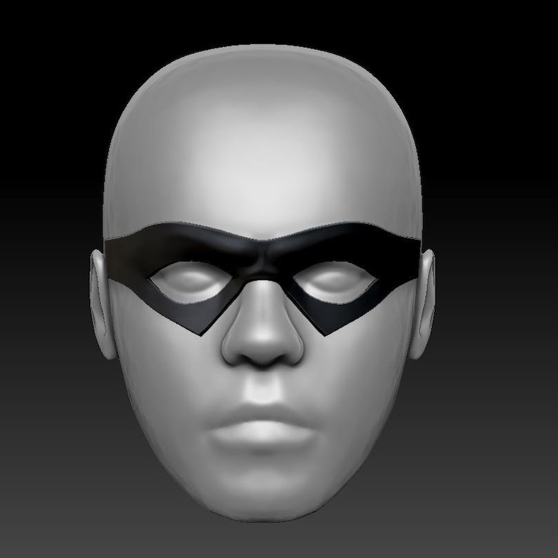 May include: A gray sculpted face with a black eye mask. The mask has a rounded shape with a slight curve at the top and bottom.