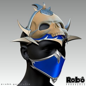 May include: A blue and silver mask with a skull design. The mask has a pointed top and a long, flowing tail. The mask is worn on a mannequin's head.
