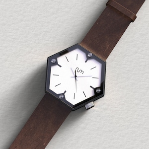 A hexagon wood watch with brown leather strap