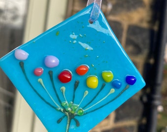 Little Hanging Rainbow Flower on turquoise fused glass Art Picture