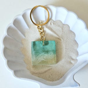 Keychain with marine look – handmade from resin with sand & color gradient