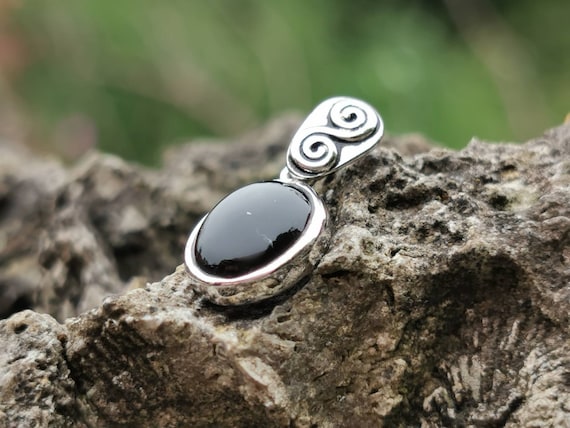 Petite Black Created Onyx and Sterling Silver Pendant. Oval Shaped. With Fine 18" Long Sterling Silver Chain.