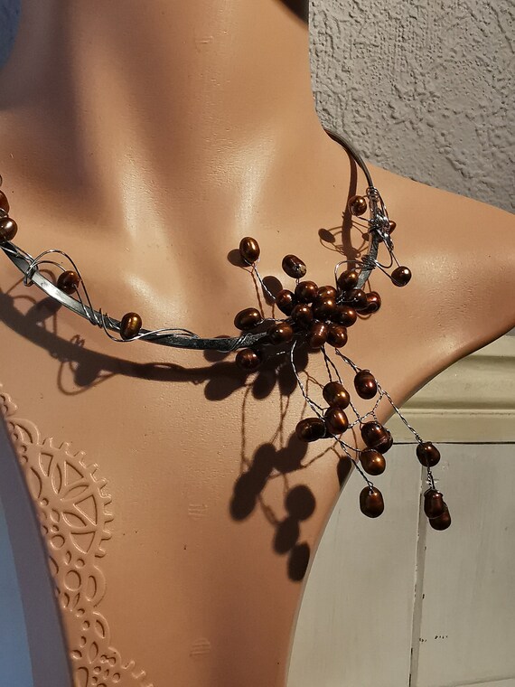 Genuine Freshwater Pearls, set on a Stainless Steel choker.