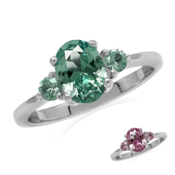 Stunning Simulated Colour Change Alexandrite Ring. Oval 8x6mm Stone set in 925 White-Gold-Plated Sterling Silver. UK Size K