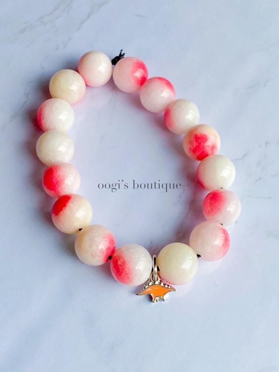 pink tourmaline gemstone dinosaur charm bracelet