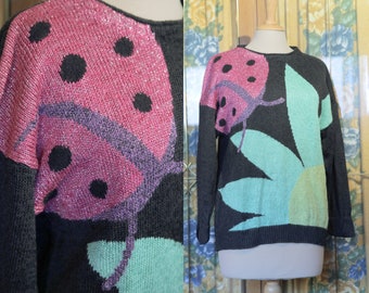 Black 1980s Knit Crew Neck Sweater with Pastel Metallic Ladybug and Flower Print | BAKKARAT