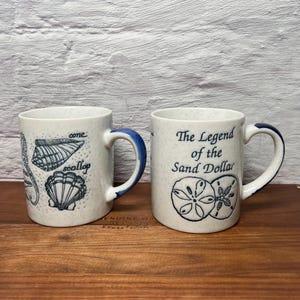 2  Vintage  Coffee Mugs Sea Life Legend of the Sand Dollar Seashells Japanese Stoneware