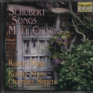 May include: CD case for "Schubert Songs for Male Chorus" by Robert Shaw and the Chamber Singers. The cover shows a weathered wooden door, brick wall, and flowering vines. The Telarc Digital logo is in the upper right.