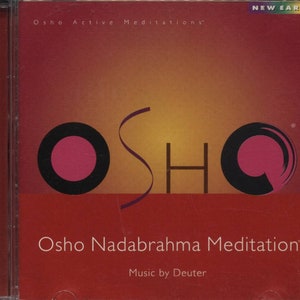 May include: A CD case with a red and orange gradient background. The cover features the word "OSHO" in a stylized font with a pink circle and a purple swirl. The text "Osho Nadabrahma Meditation" is below, with "Music by Deuter" at the bottom.