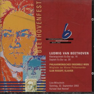 May include: CD case for the Beethovenfest Bonn 2002, featuring a portrait of Beethoven in orange, yellow, and blue. The cover includes text in German, including the composer's name and the ensemble's name.