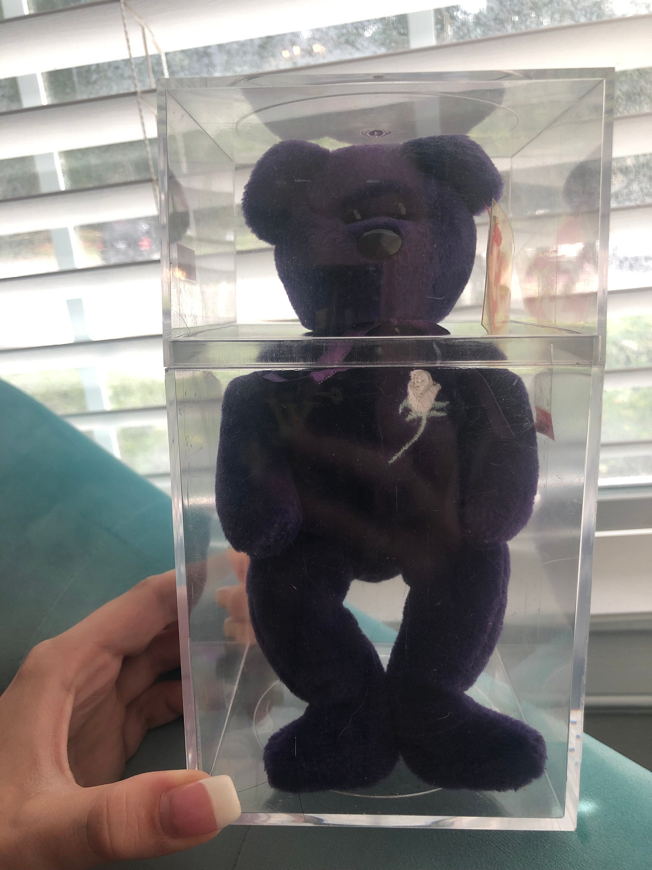 purple ty bear with white rose