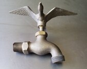 Brass Faucet Spigot Tap spout. Outdoor Hose Spigot shape of mother goose.