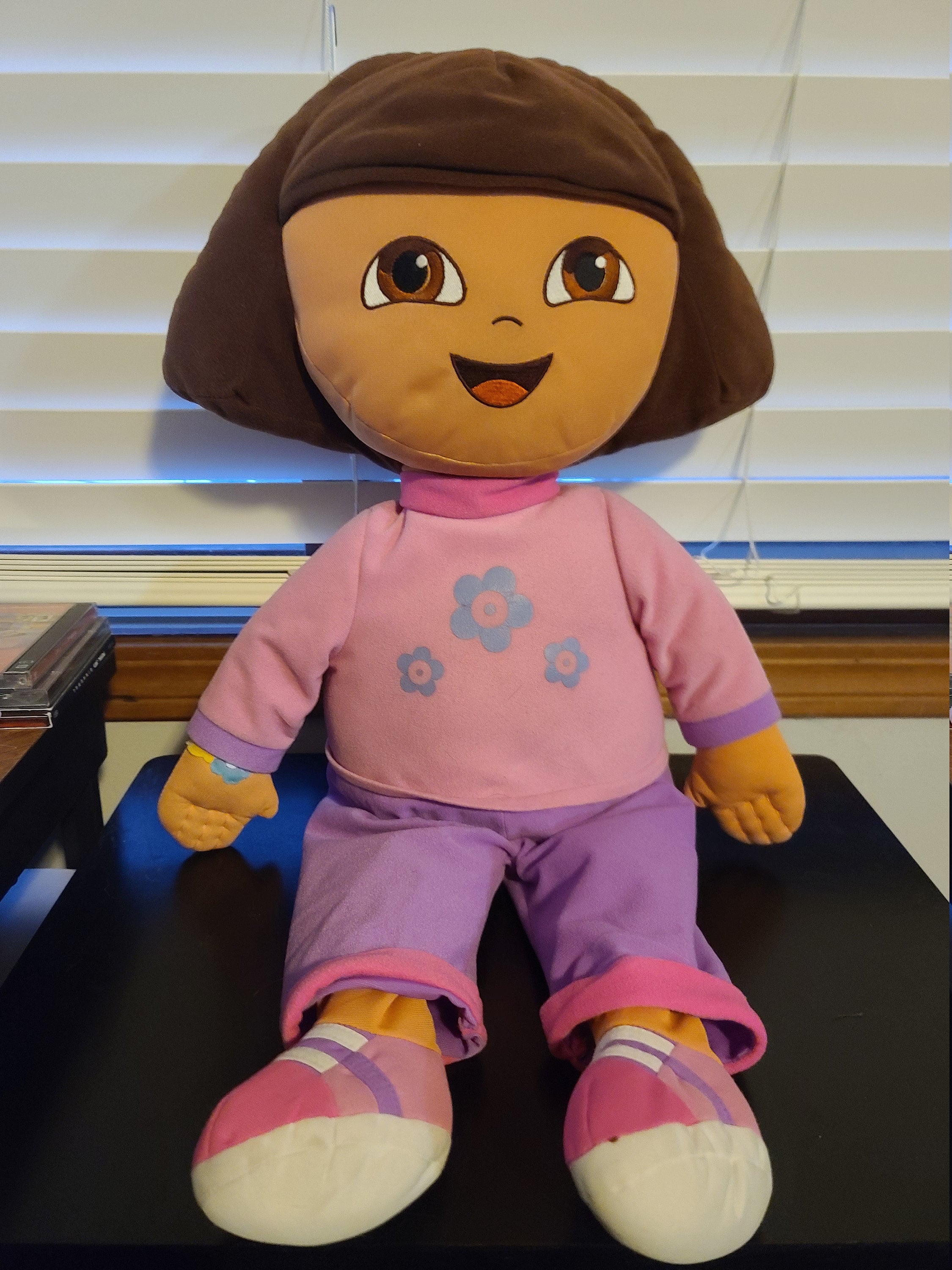 Meme of dora the explorer with a chad face