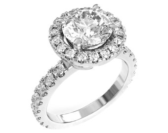 Könnte beinhalten: Ein silberner Verlobungsring mit einem großen runden Diamanten in der Mitte, der von einem Heiligenschein aus kleineren Diamanten umgeben ist. Die Ringschiene ist ebenfalls mit kleineren Diamanten besetzt.