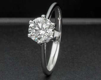 Anillo de compromiso de diamantes cultivados en laboratorio de 1,5 quilates: solitario con halo de platino