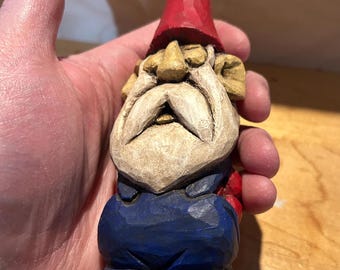 Hand-carved wooden gnome sculpture by David Therrien, a Quebec artist