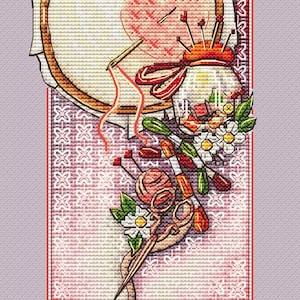 May include: A cross-stitch design featuring a wooden embroidery hoop with a heart, a pincushion, scissors, and floral accents. The color palette includes shades of pink, white, and brown, with a decorative border.