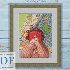 May include: Cross stitch pattern PDF for a woman reading a book titled "The Lion, the Witch, and the Wardrobe" with the text "Chronicles of Narnia Prince Caspian" visible in the background. The woman is surrounded by autumn leaves and a blue and white patterned blanket.