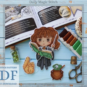May include: Cross stitch pattern PDF for a cartoon illustration of a young woman with brown hair holding a book and a wand. The pattern includes a cauldron, a cat, and a spool of thread. The text "Daily Magic Stitch" and "INSTANT DOWNLOAD" are visible in the image.
