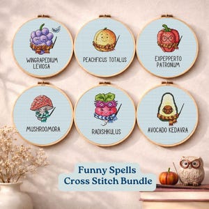 May include: A collection of six cross-stitch embroidery hoops featuring whimsical designs of fruits and vegetables with wizard-themed accessories. Each design includes a funny spell name. The text "Funny Spells Cross Stitch Bundle" is also present.