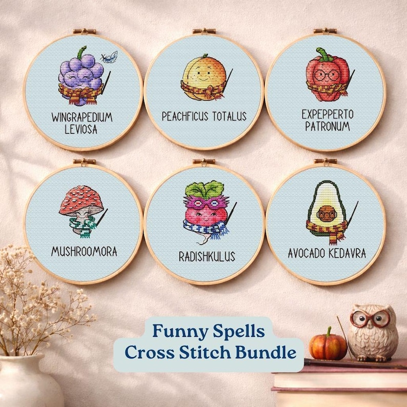 May include: A collection of six cross-stitch embroidery hoops featuring whimsical designs of fruits and vegetables with wizard-themed accessories. Each design includes a funny spell name. The text "Funny Spells Cross Stitch Bundle" is also present.