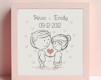 May include: A white framed picture with a black and white illustration of a couple holding a heart. The text "Kevin Emily 09/12/2012" is printed above the couple.