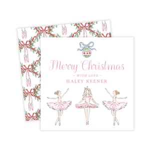 May include: A square greeting card featuring a watercolor illustration of three dancers in pink tutus, a Christmas ornament, and the text Merry Christmas with love HALEY KEENER. The back shows a pattern of ballet slippers, red bows, and greenery.