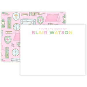 May include: A set of stationery featuring a pink background with camping-themed illustrations. The stationery includes a notepad with the text "FROM THE BUNK OF BLAIR WATSON" in pastel colors. The design includes tents, compasses, and lanterns.