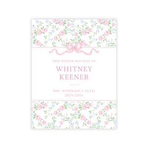 May include: A personalized binder with a floral design. The cover features a white background with pink roses, blue flowers, and green leaves. The text reads "THIS BINDER BELONGS TO WHITNEY KEENER MRS. ROBINSON'S CLASS 2025-2026". A pink ribbon design is at the top.