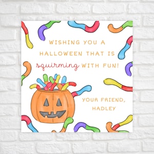 May include: A square Halloween card featuring a central orange jack-o'-lantern filled with colorful gummy worms. The text reads: WISHING YOU A HALLOWEEN THAT IS squirming WITH FUN! YOUR FRIEND, HADLEY. Additional gummy worms are scattered around the border.