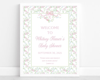 Puede incluir: Un cartel de bienvenida blanco con un borde floral y letras rosas. El cartel dice "Bienvenido a Whitney Keener's Baby Shower 30 de septiembre de 2024 'Todo buen don y todo regalo perfecto desciende de lo alto.' Santiago 1:17"