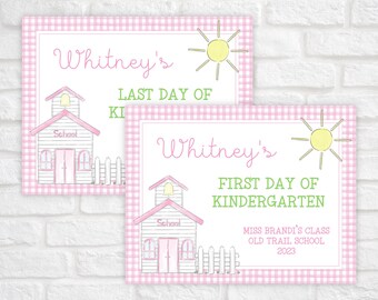 May include: Two pink and white gingham signs with a cartoon schoolhouse and sun. The top sign says "Whitney's Last Day of Kindergarten". The bottom sign says "Whitney's First Day of Kindergarten" with the text "Miss Brandi's Class Old Trail School 2023".