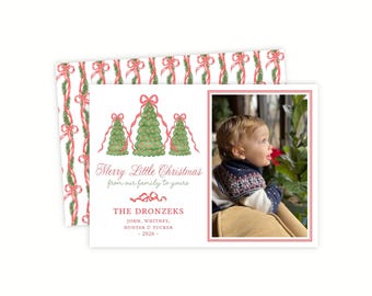 May include: A rectangular holiday greeting card featuring a watercolor illustration of three green Christmas trees with pink bows. The text reads Merry Little Christmas from our family to yours, THE DRONZEKS, JOHN, WHITNEY, HUNTER & TUCKER - 2026.