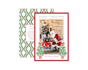 May include: A rectangular Christmas greeting card featuring a photo of a family with Santa Claus. The card has a red border, the text Merry Christmas, and watercolor illustrations of green garlands and red bows. The Keener Family 2025 is printed.