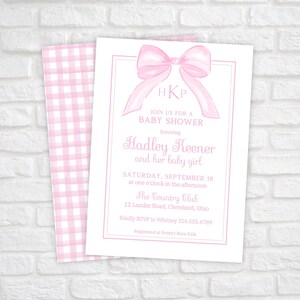 May include: Pink baby shower invitation with a watercolor bow and the text "HKP", "Join us for a Baby Shower", "honoring Hadley Keener and her baby girl", "Saturday, September 18 at one o'clock in the afternoon", "The Country Club", "12 Lander Road, Cleveland, Ohio", "Kindly RSVP to Whitney 216.555.6789", "Registered at Pottery Barn Kids".